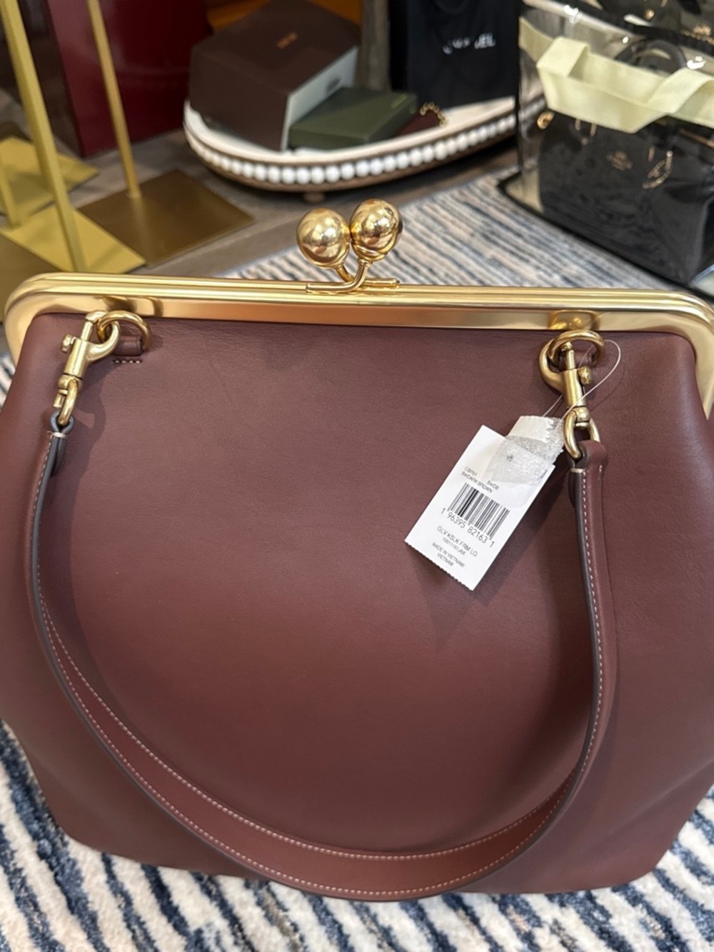 Brand new Coach large brown Kisslock bag